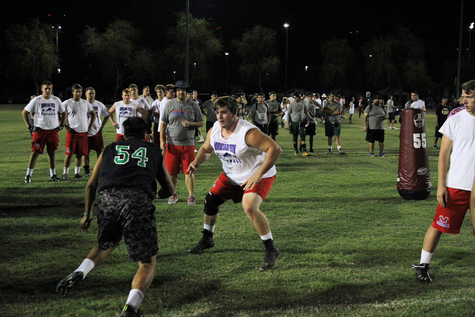 Football player prepares to tackle another player